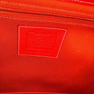 Coach Bag with Bold Red Interior